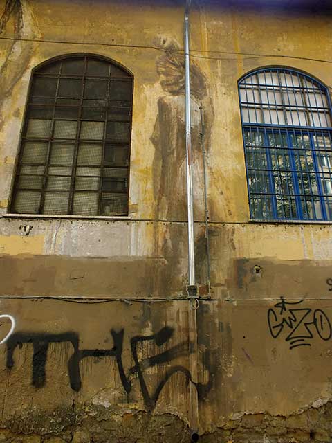 Graffiti  zona Ostiense: 18 - Borondo (Spagna)
